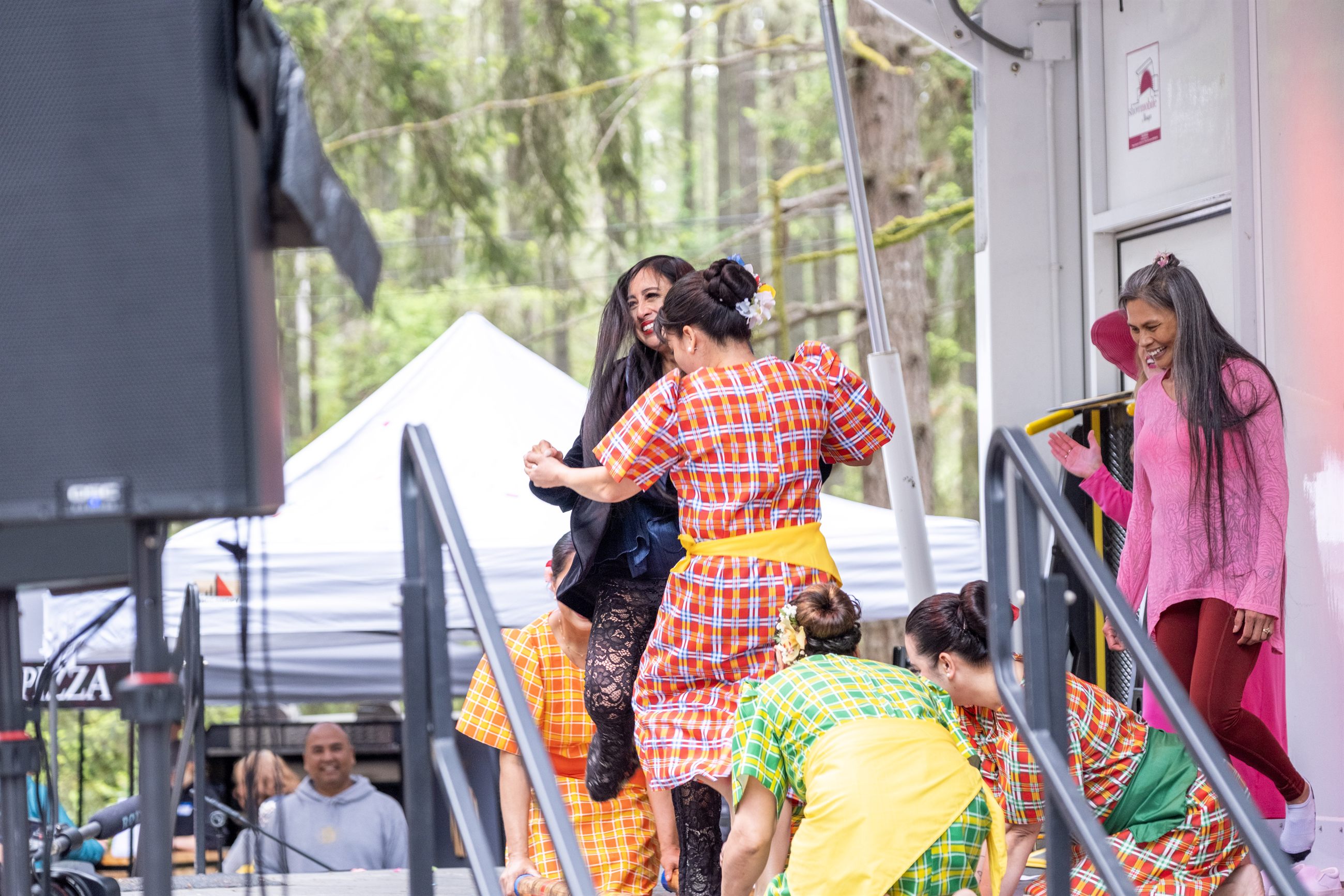 Community volunteers helping with setup and festival flow.
