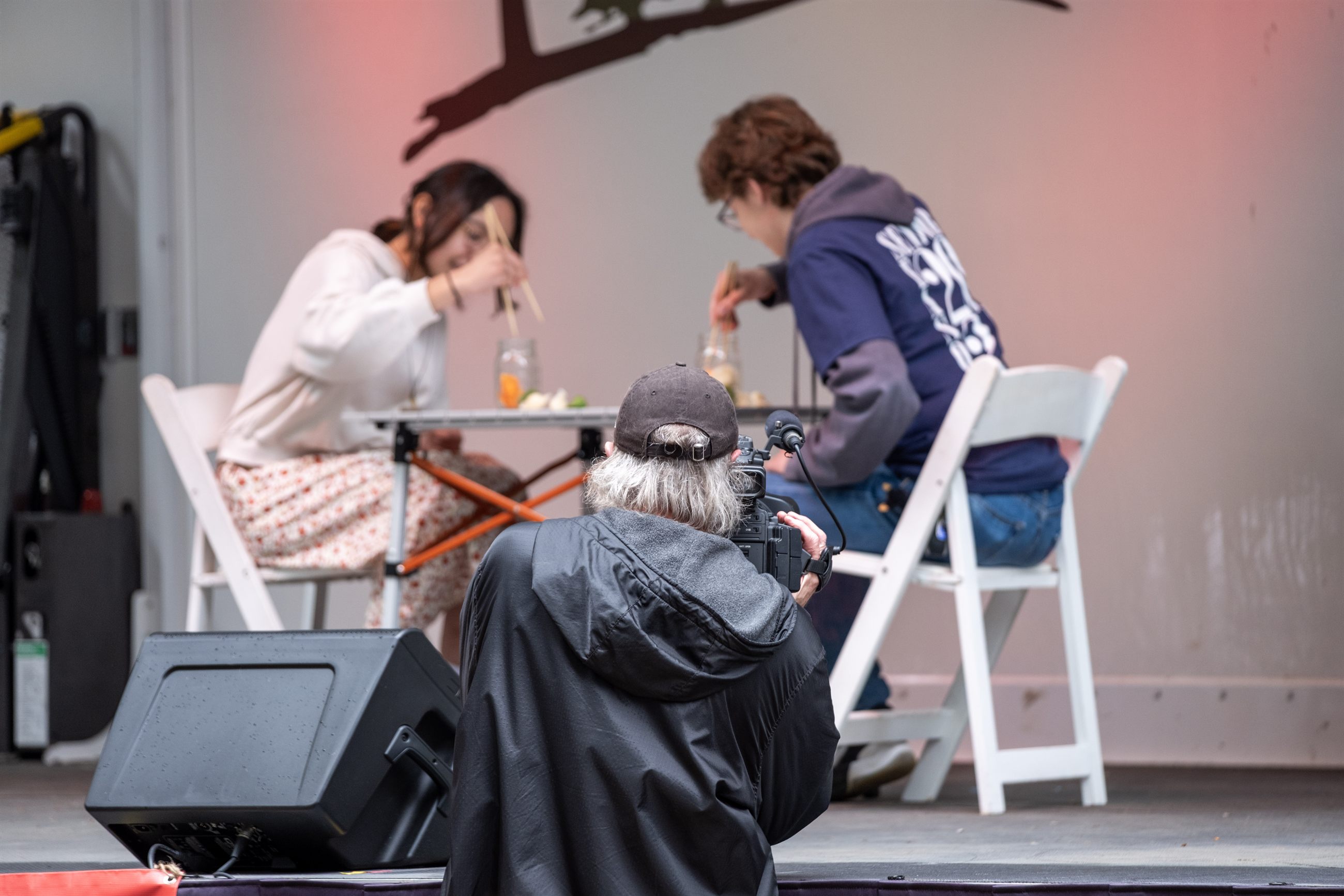 Volunteer team and community members supporting festival guests.